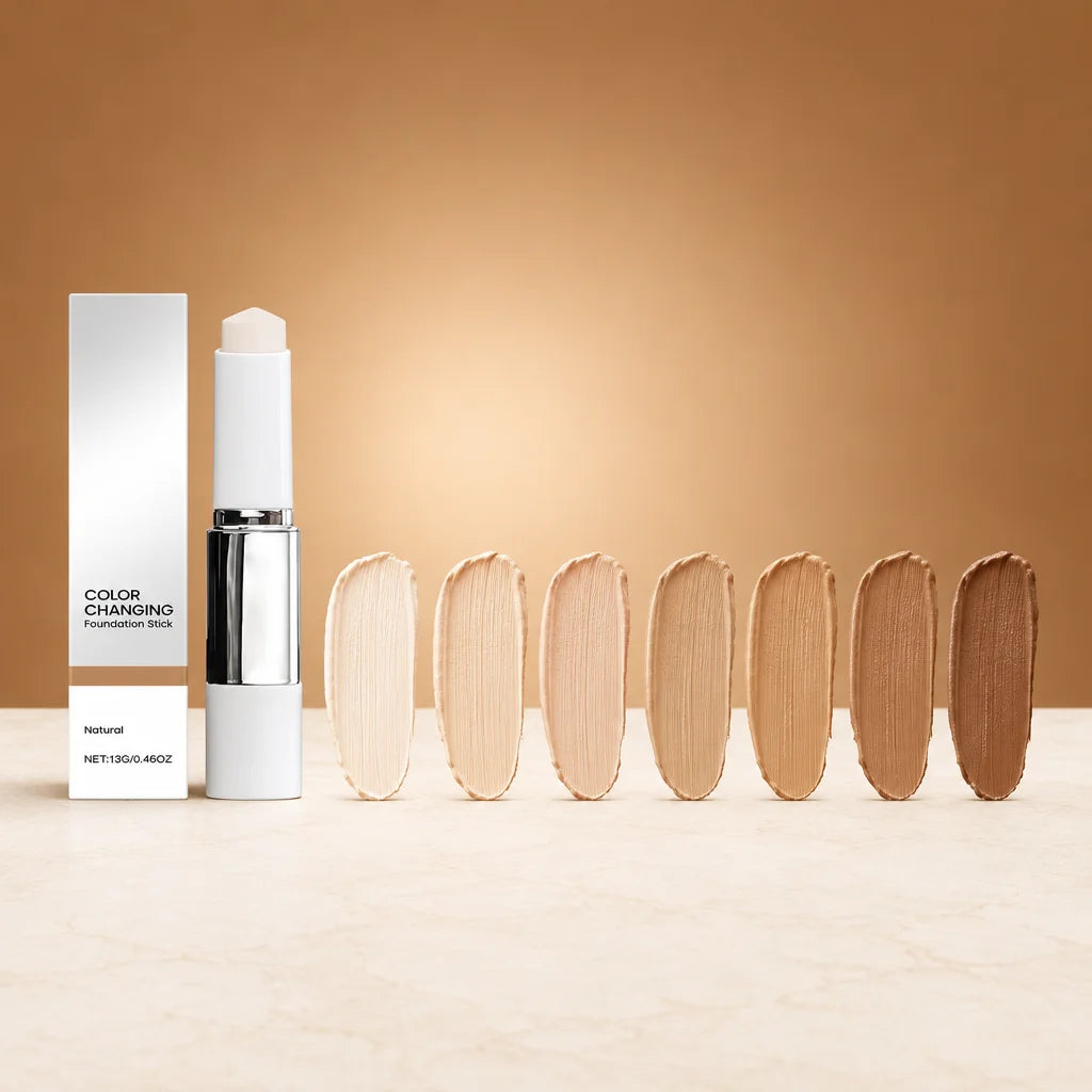 A square studio comparison of exactly seven equal pale foundation swatches in a clean row, each a di